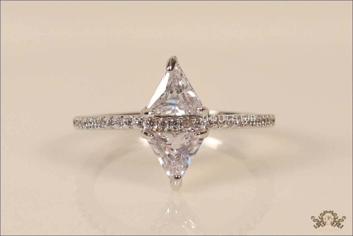 platinum plated ring with triangle cut pointers and fine cz