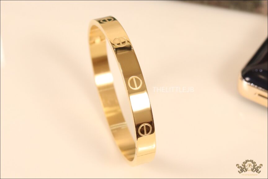 Gold plated mens bracelet with screws 