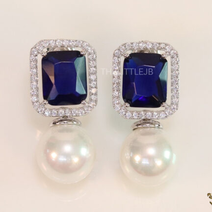 CZ earrings with 11mm sapphire blue stone and white pearl