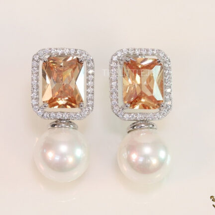 CZ earrings with 11mm champagne coloured stone and white pearl