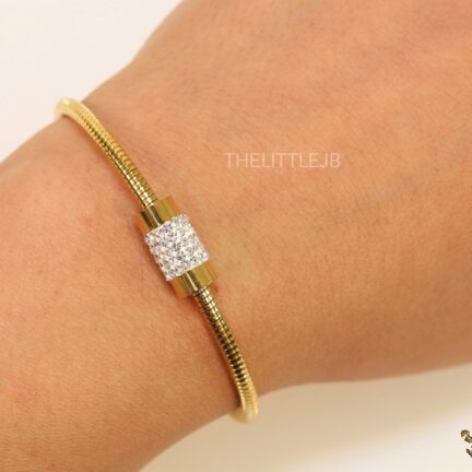 b6 Gold plated coil bracelet with cylindrical cz motif