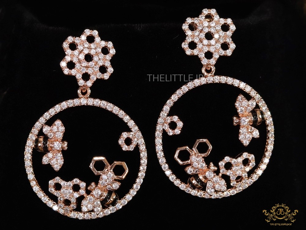 Rose gold plated circular cz earrings with honey bee and flower pattern