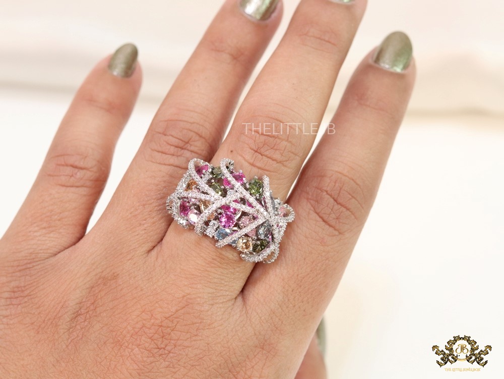 Platinum plated cz cage ring with multicoloured stones