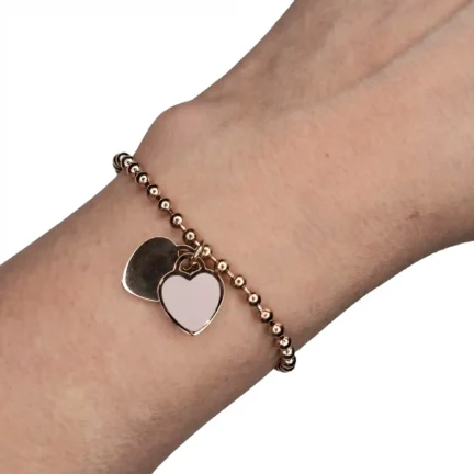 B2 Openable rose gold plated chain bracelet with heart motif