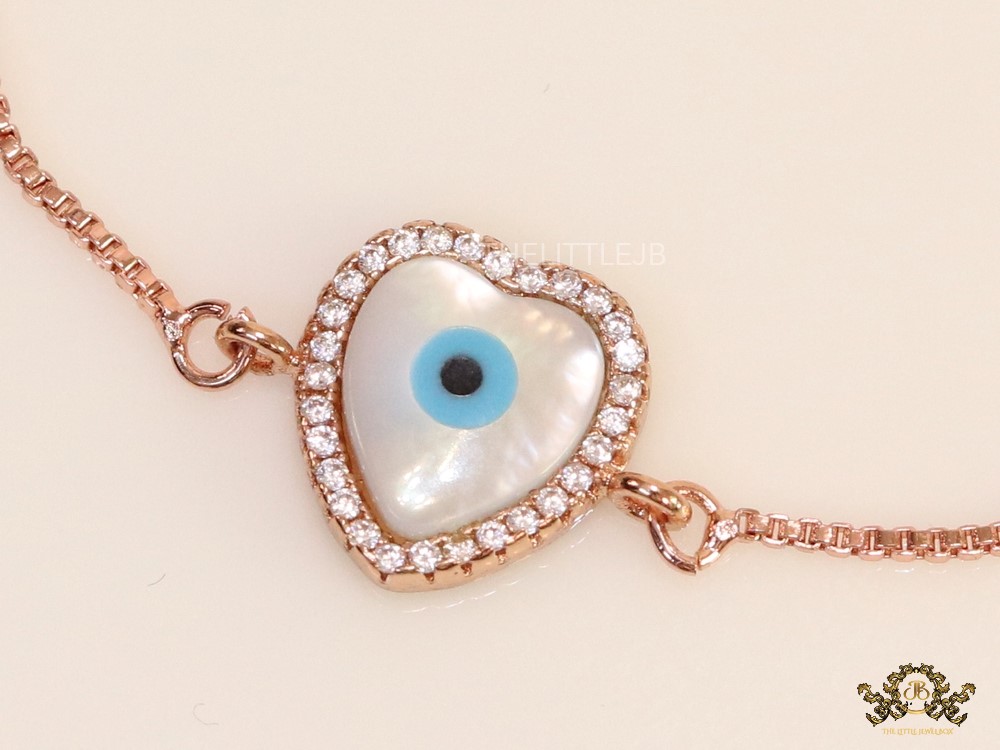 Medium heart shaped mother of pearl and cz evil eye sling bracelet in rose gold - Image 2