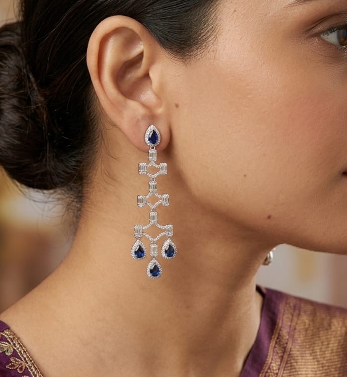 Platinum plated cz dangles with sapphire blue drops
