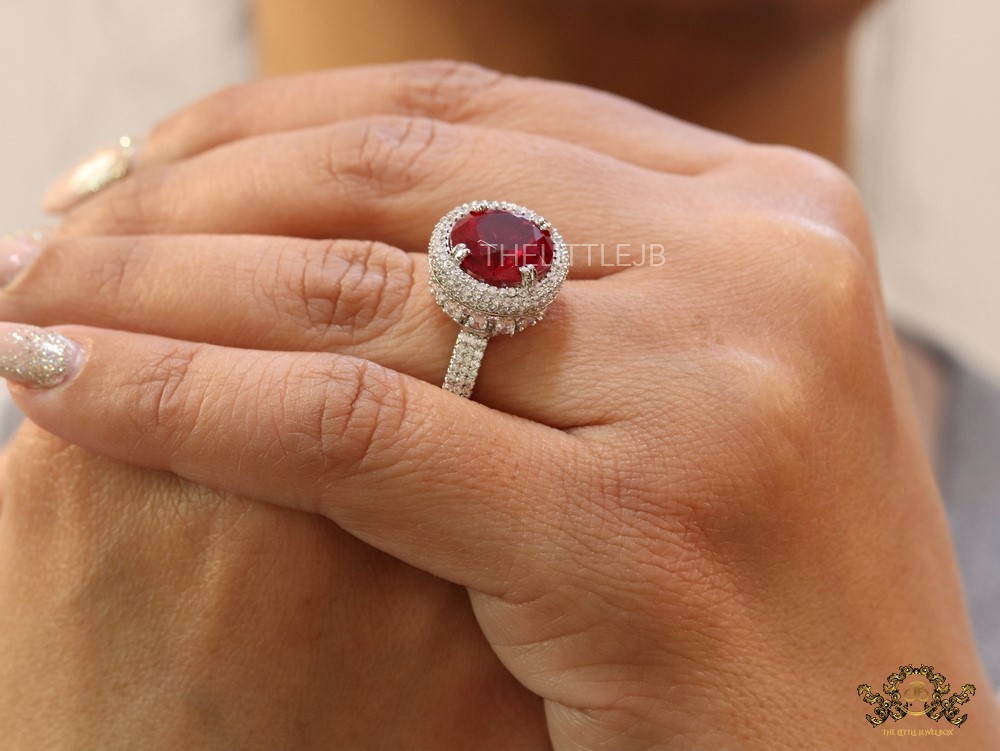 Round ruby red stone ring in platinum and cz