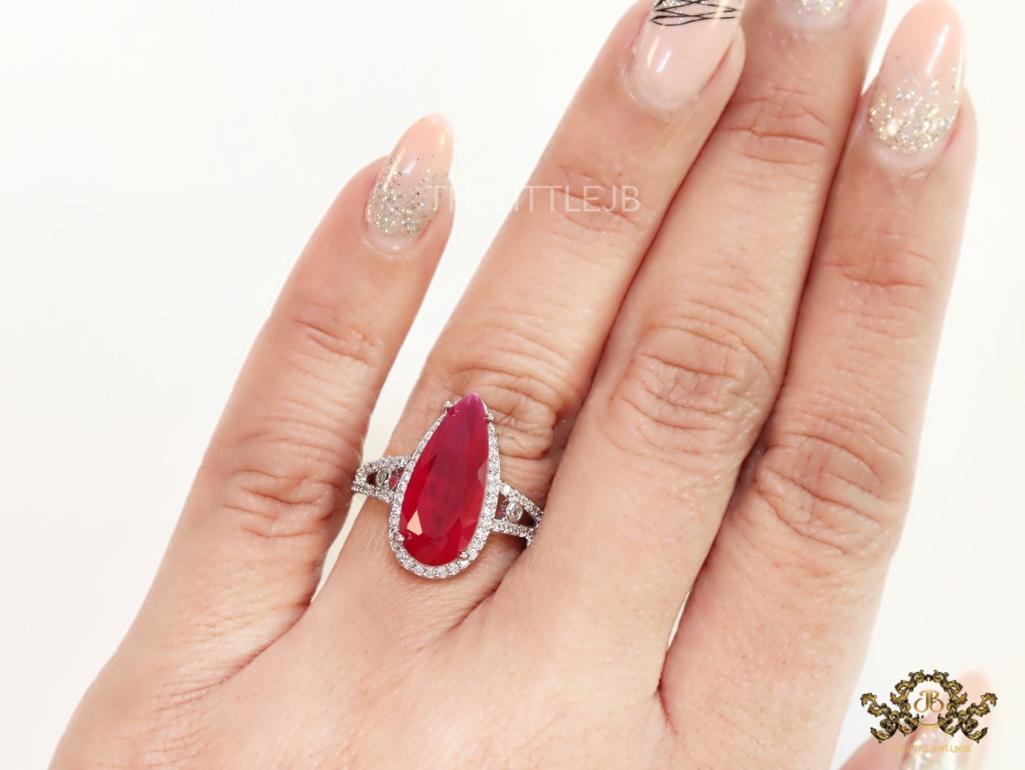 Drop shaped ruby red stone ring in platinum and cz - Image 2