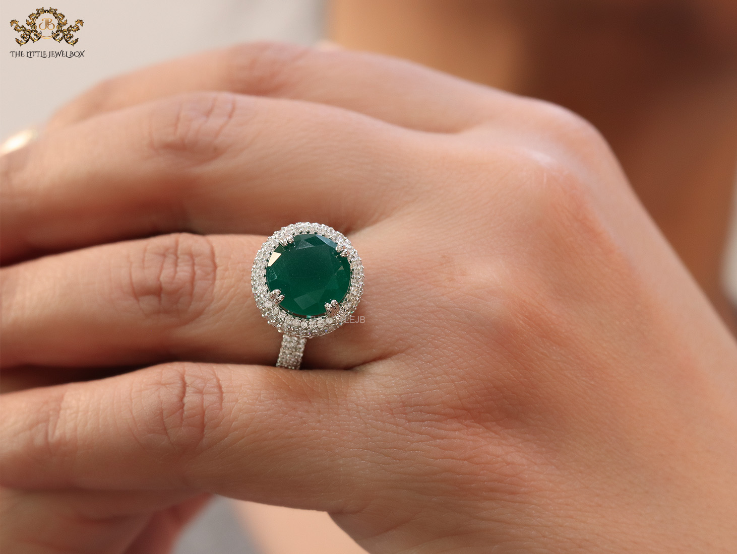 Round emerald green stone ring in platinum and cz – The Little