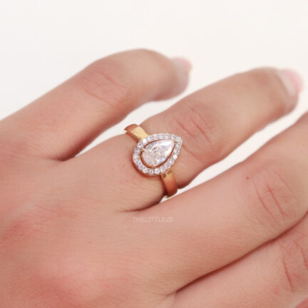 Adjustable gold plated drop shaped cz ring