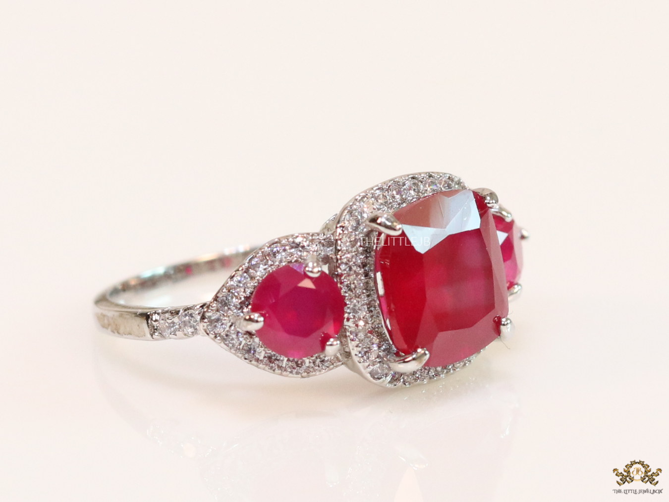 Platinum cz ring with ruby red stones - Image 4