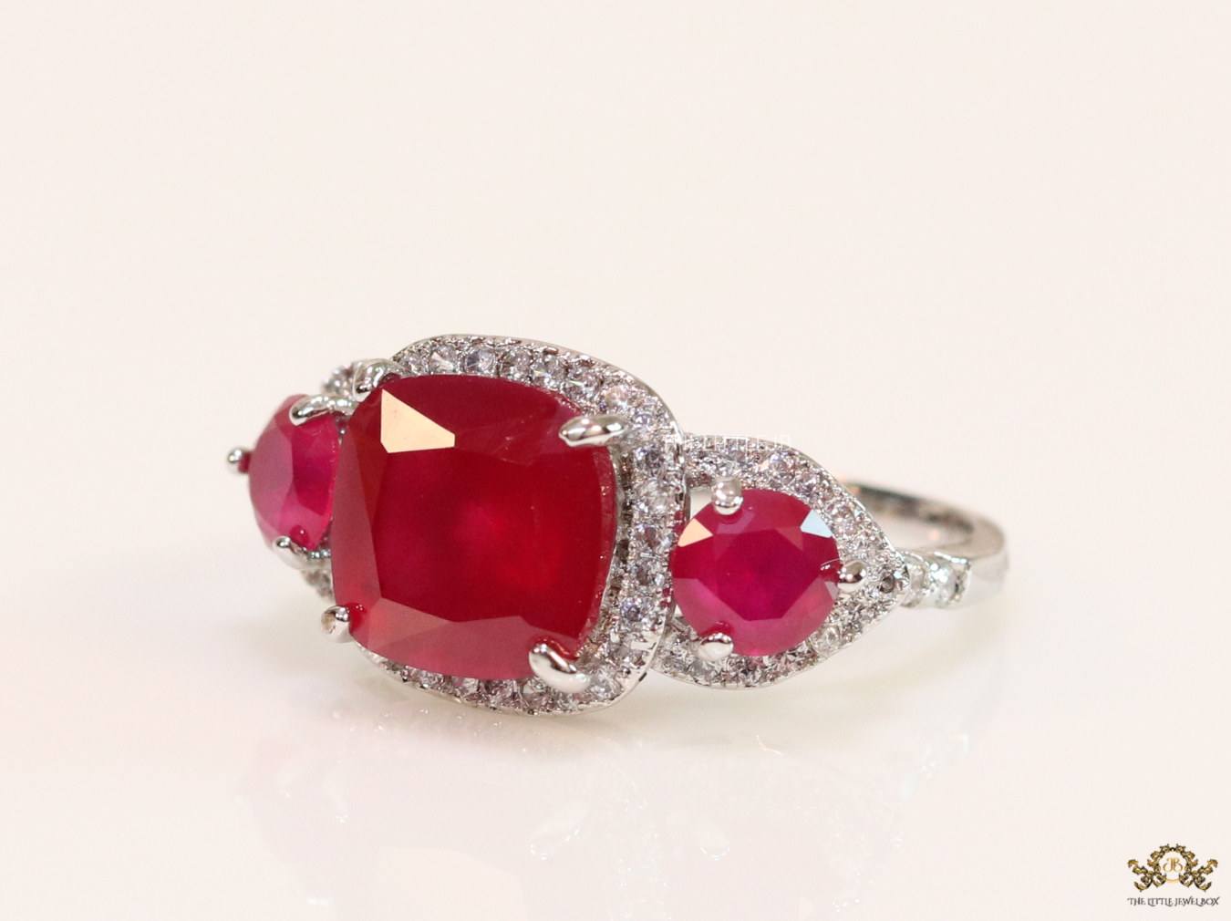 Platinum cz ring with ruby red stones - Image 3