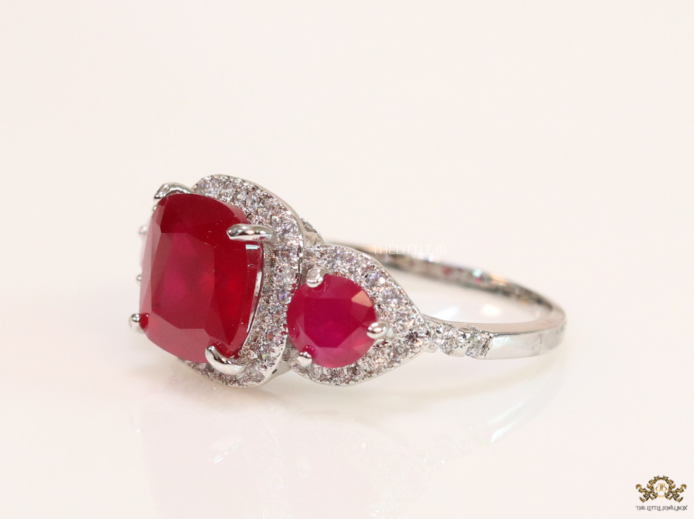 Platinum cz ring with ruby red stones - Image 2
