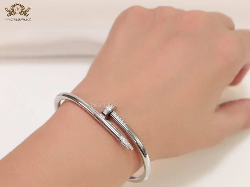 Platinum plated open nail bracelet 