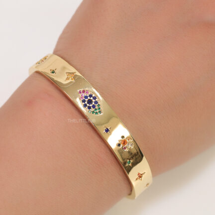 b3 Gold plated broad band bracelet with multi cz motifs