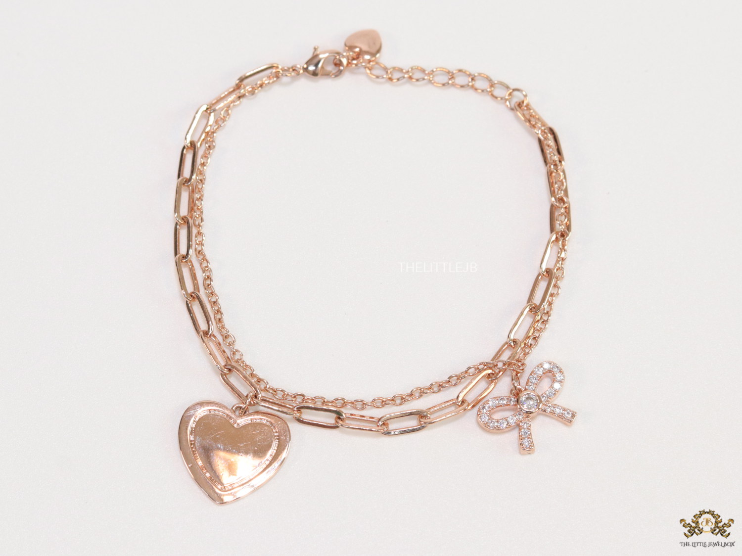 Dual chain rose gold bracelet with heart and bow - Image 2