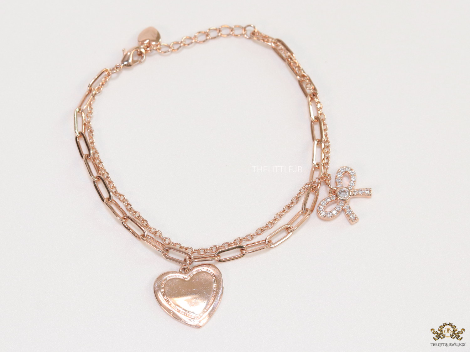 Dual chain rose gold bracelet with heart and bow - Image 3