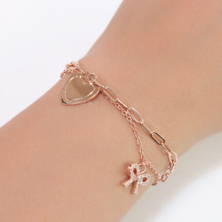 b17 Dual chain rose gold bracelet with heart and bow
