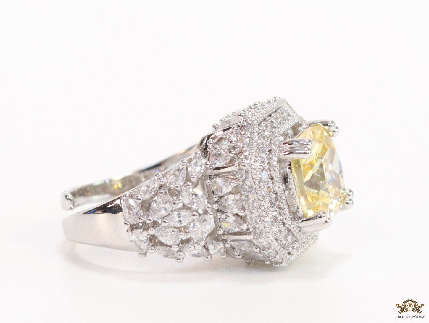 Platinum plated cz open ring with topaz yellow stone - Image 5