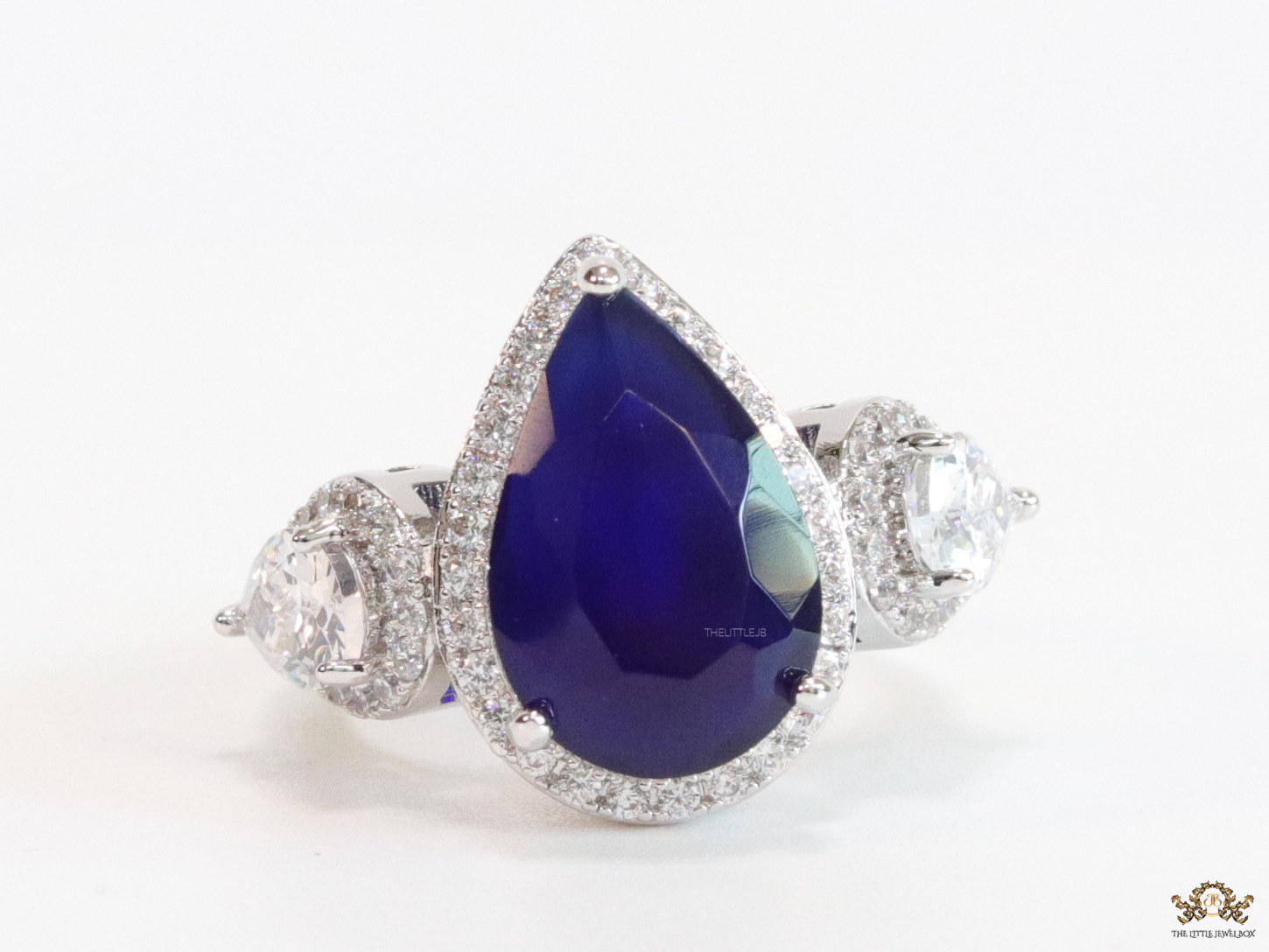 Drop shaped sapphire blue stone open ring with cz - Image 5