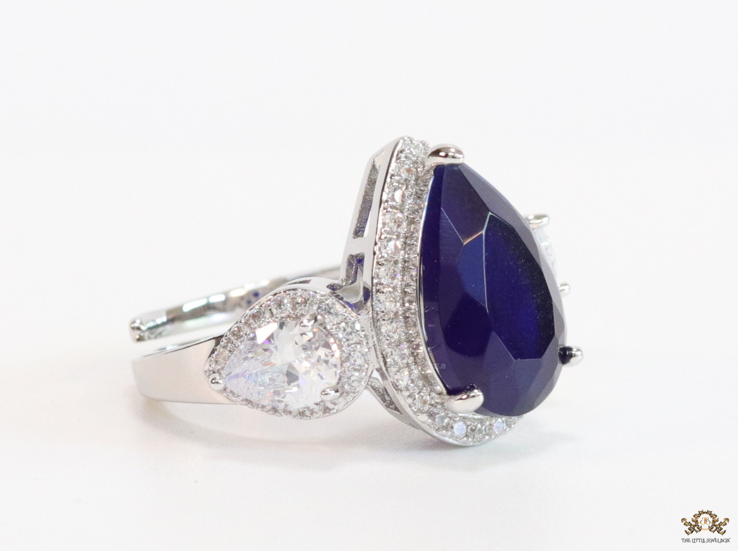 Drop shaped sapphire blue stone open ring with cz - Image 4