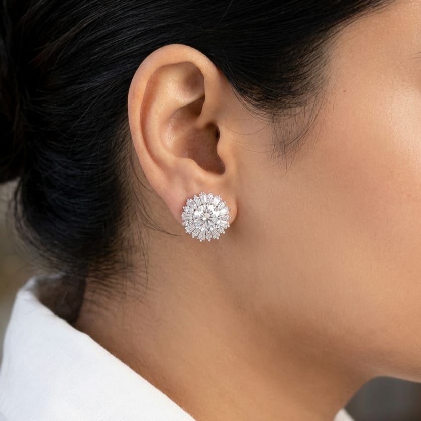 Platinum studs lined with cz baguettes and detachable solitaire tops