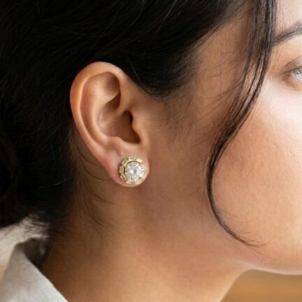 Flower shaped cz stud earrings in gold finish with detachable solitaire tops