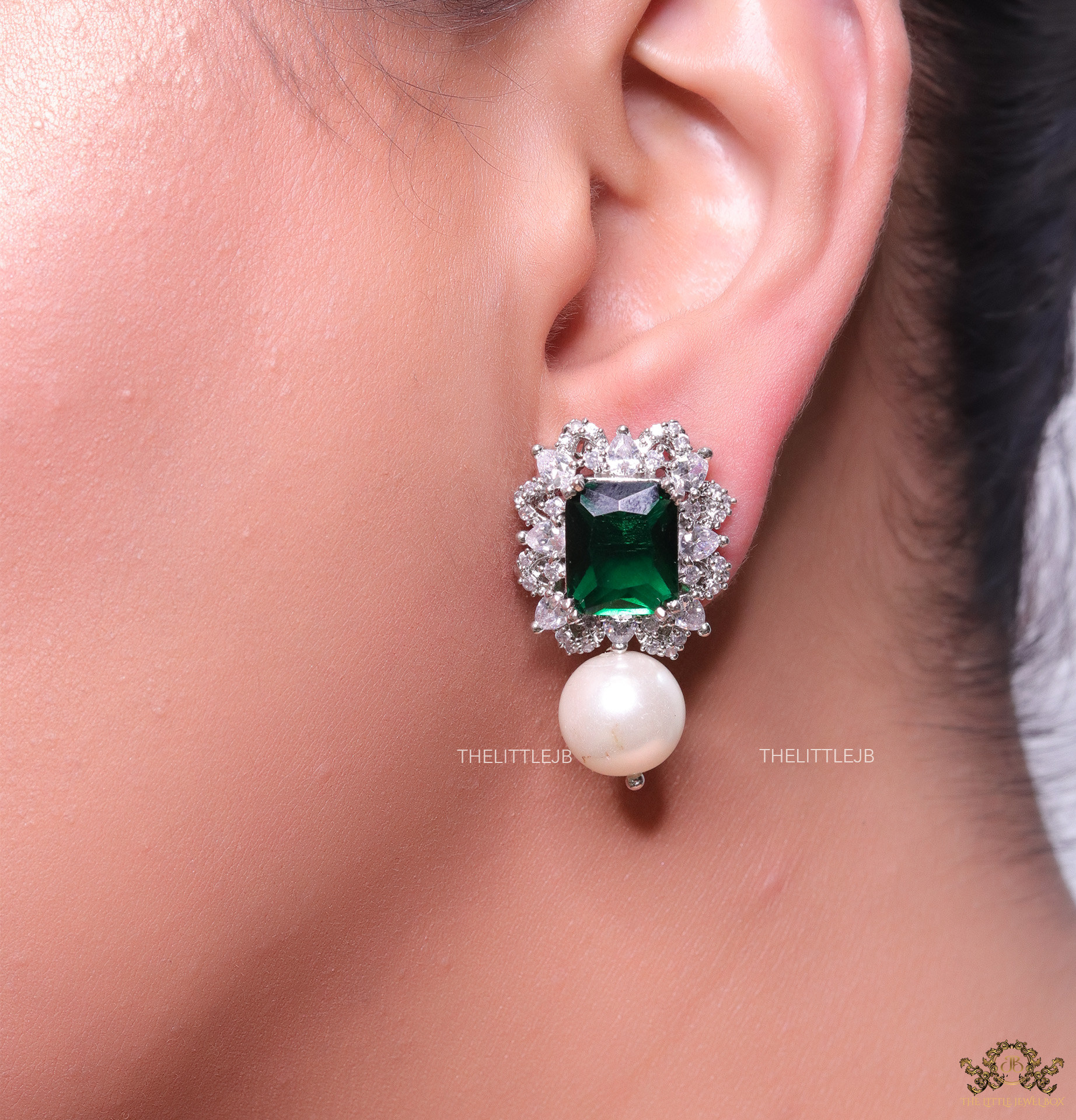 Emerald green stone earrings with fancy cut cz and pearl drop