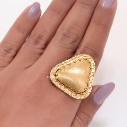 Matte finish goldplated open ring with hammered design in triangle shape.