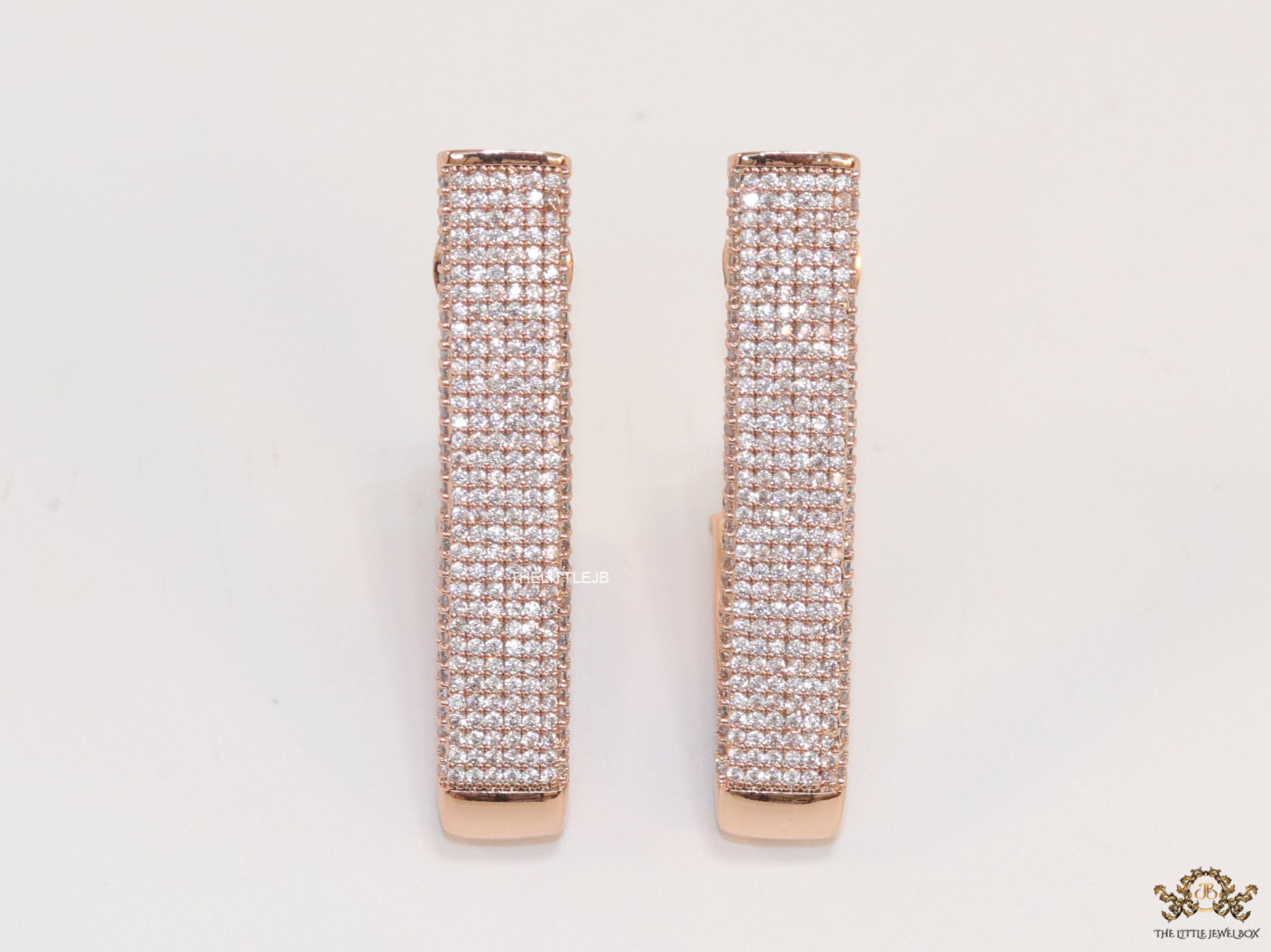 Rectangular bent screw back cz earrings in rose gold finish - Image 4