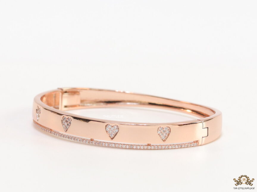 A delicate matte rose gold kada style bracelet Mesmerize India