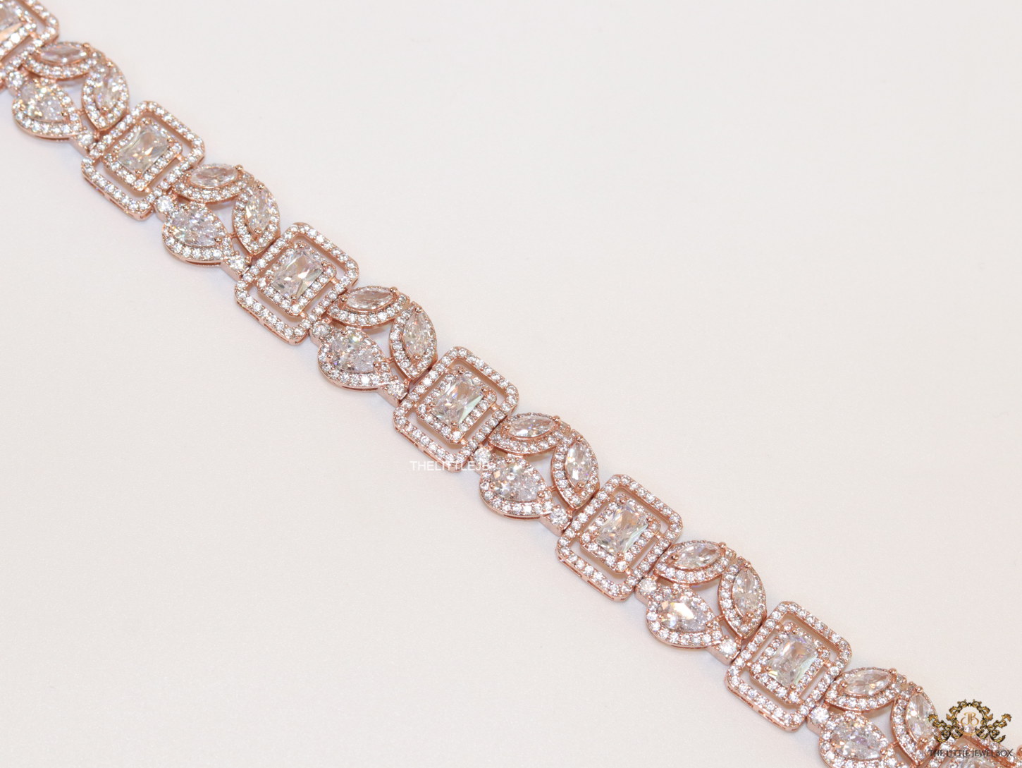 Openable Asymmetrical fancy cut cz bracelet in rose gold finish - Image 2