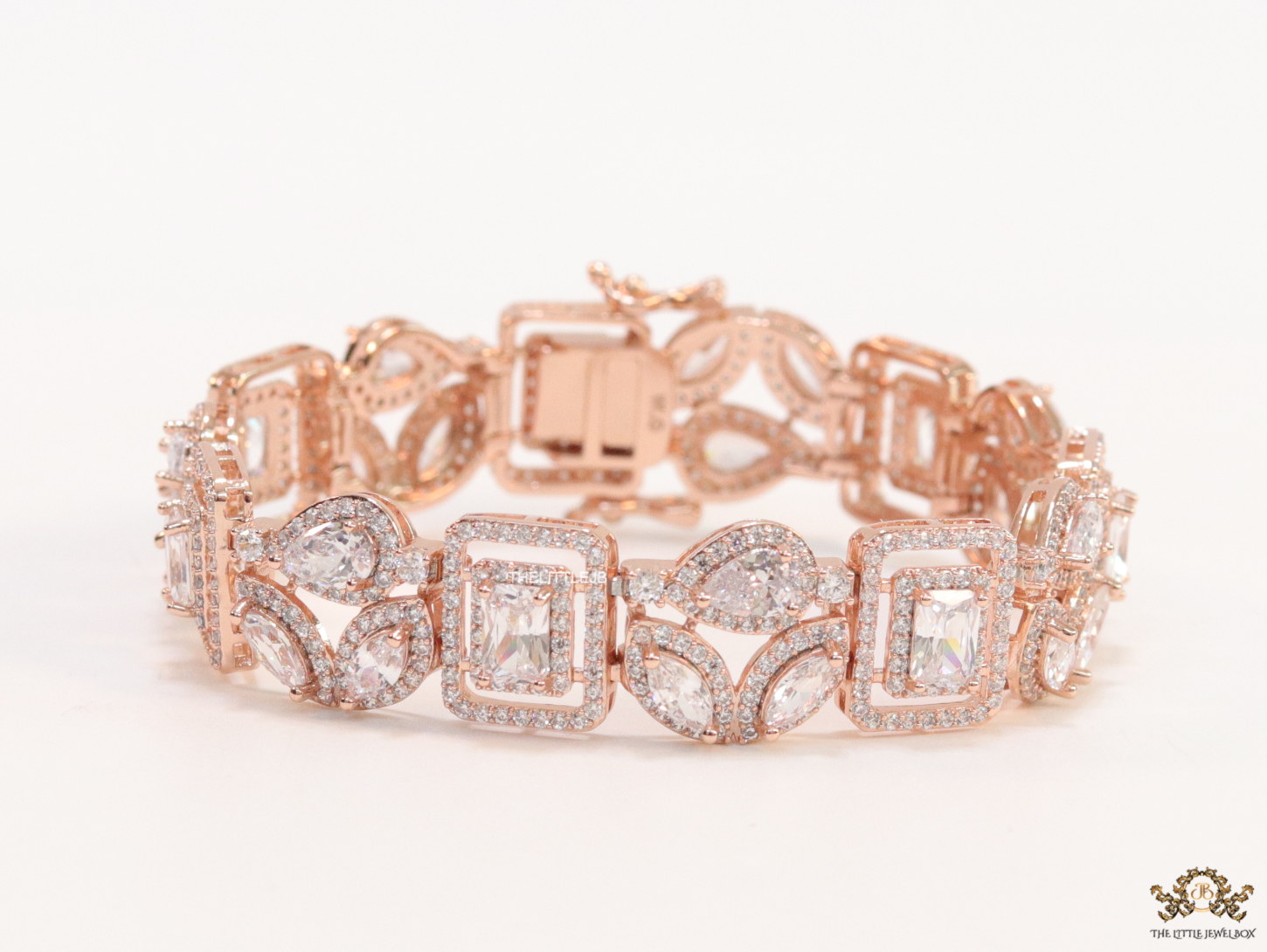 Openable Asymmetrical fancy cut cz bracelet in rose gold finish - Image 3
