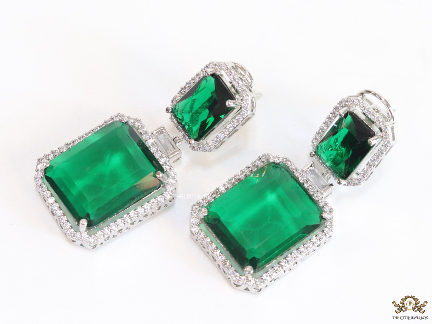 Emerald green drop platinum earrings with cz lining - Image 4