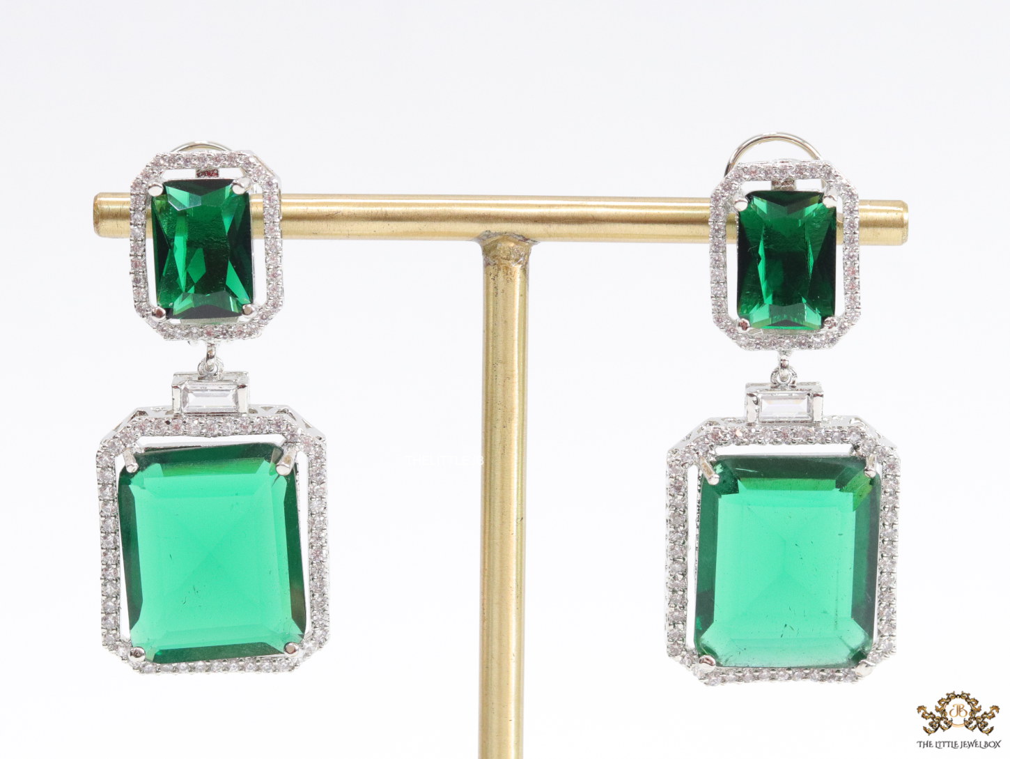 Emerald green drop platinum earrings with cz lining - Image 2