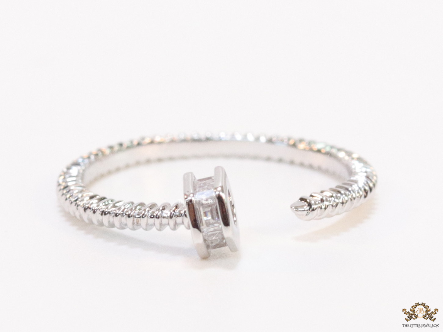 Top open silver nail shape ring with cz stones - Image 2