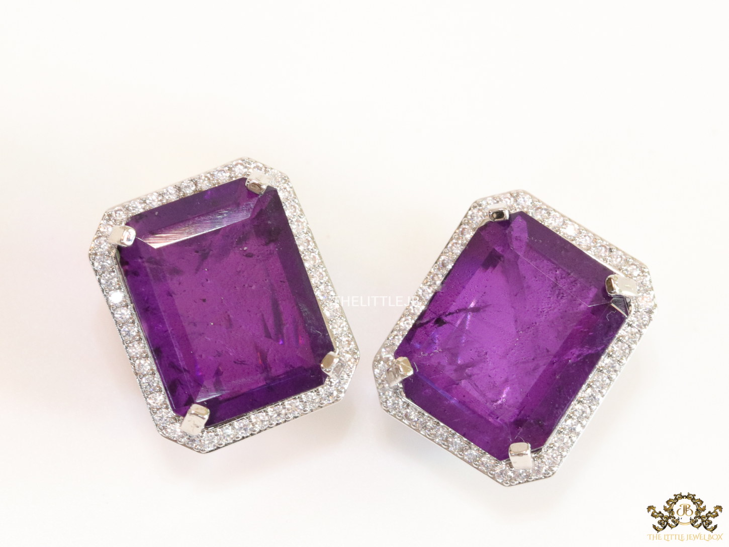 Platinum plated studs with purple doublet stone and white cubic zirconia stones lining - Image 4