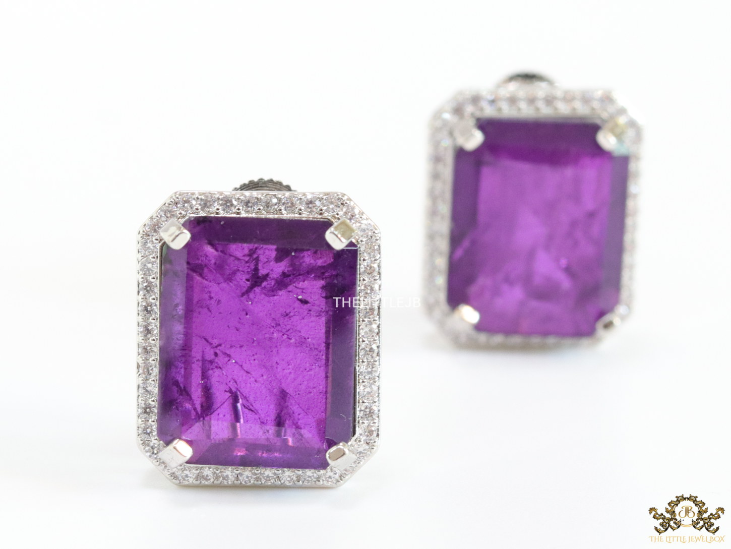 Platinum plated studs with purple doublet stone and white cubic zirconia stones lining - Image 6
