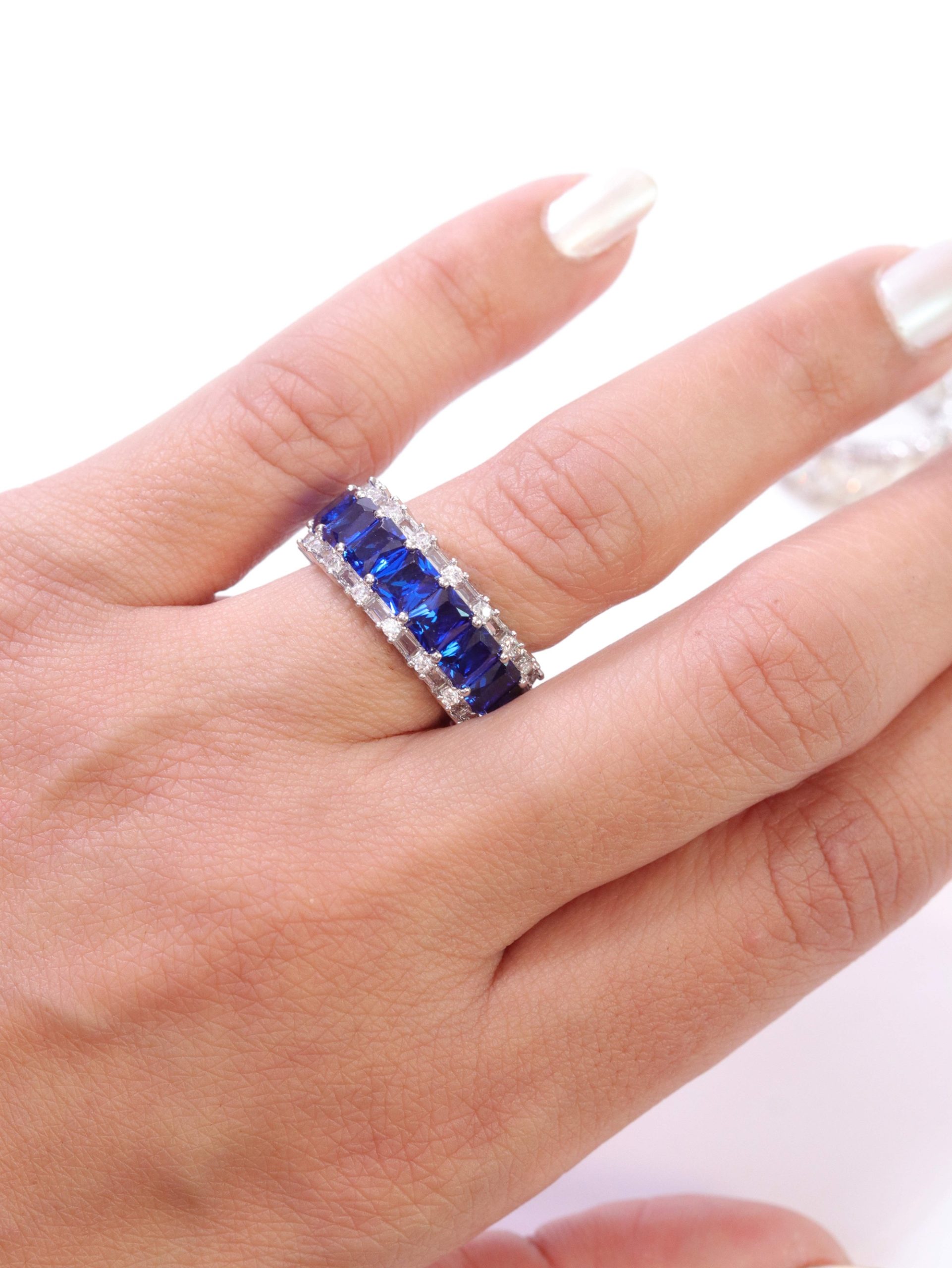 Platinum and blue baguette ring