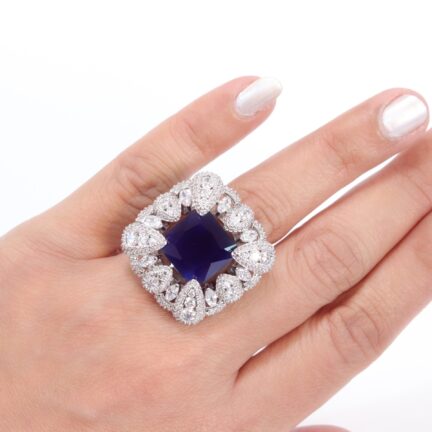 r7 (2) Cz wrapped blue sapphire ring