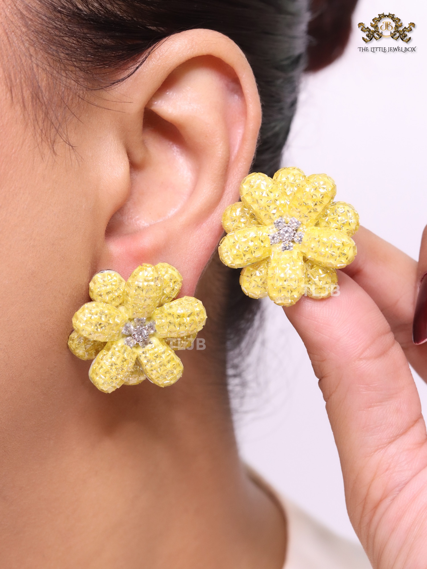 Yellow flower studs with cz