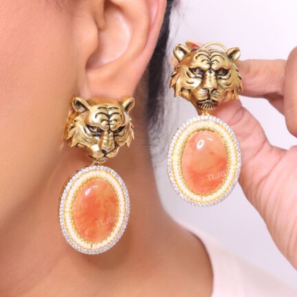 Antique tiger face with orange stone