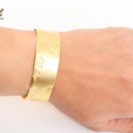 Abstract gold bracelet