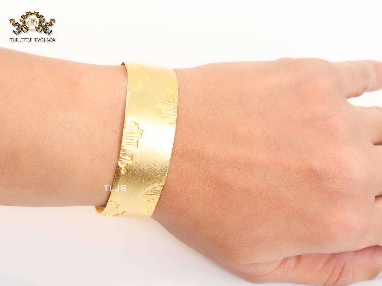Abstract gold bracelet