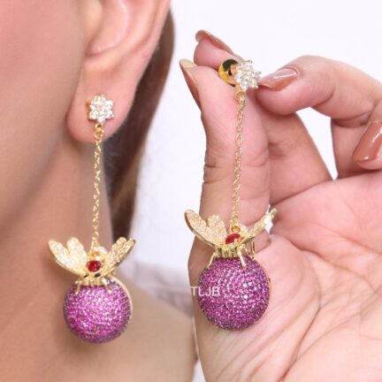 Butterfly motif and half ball danglers in pink cz