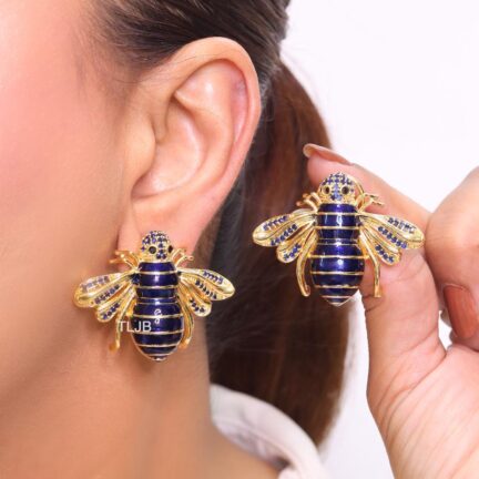 Gold and blue bee studs in enamel and cz