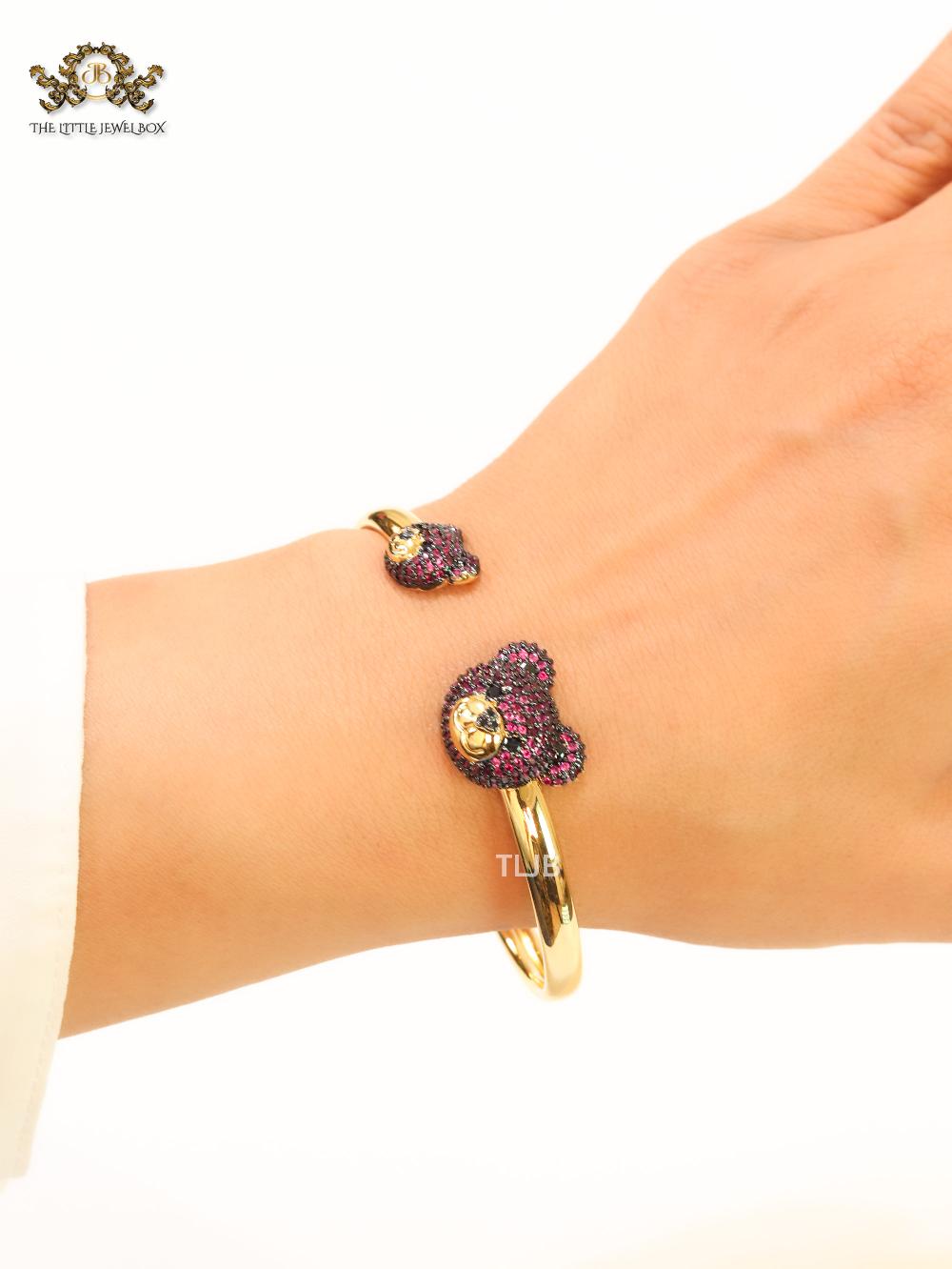 Purple Cz and gold teddy bracelet