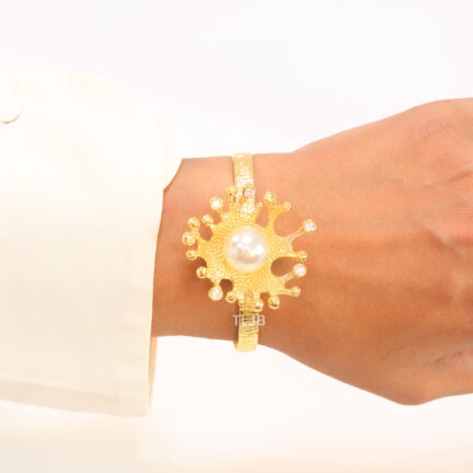 Pearl and gold splash bracelet