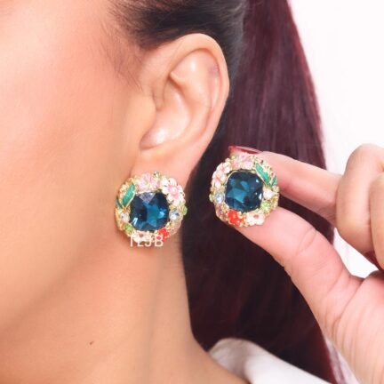 Enchanting enamel and blue stone studs