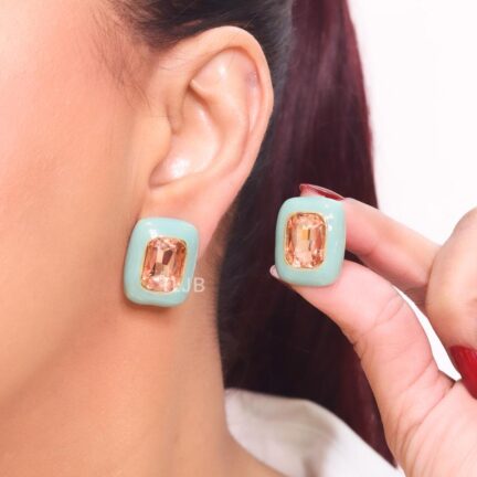 Blue enamel and pink stone studs